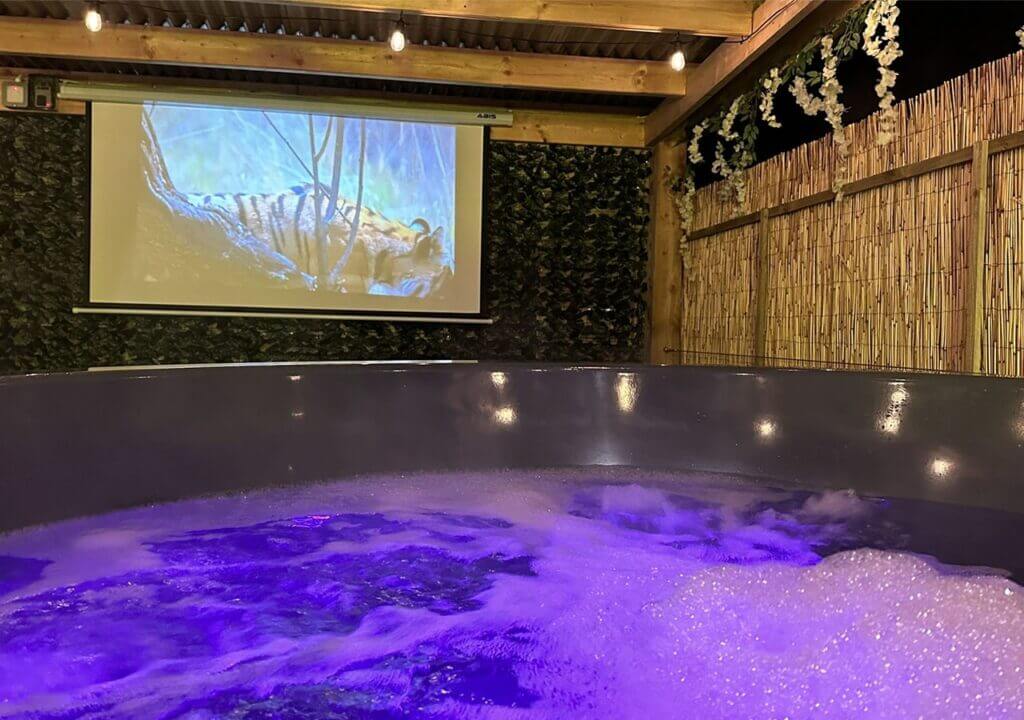 Enjoying Glen Getaway hot tub, watching movie, and relaxing